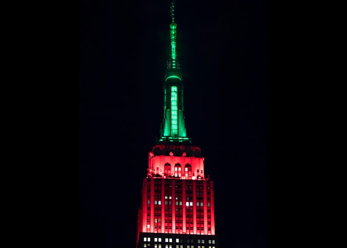 The Empire State Building Lights Up For the Christmas Spectacular The Radio City Rockettes